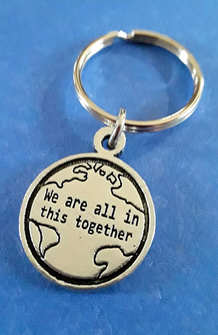 We are all in this together keychain