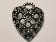 Holes In Heart Genuine American Pewter Charm
